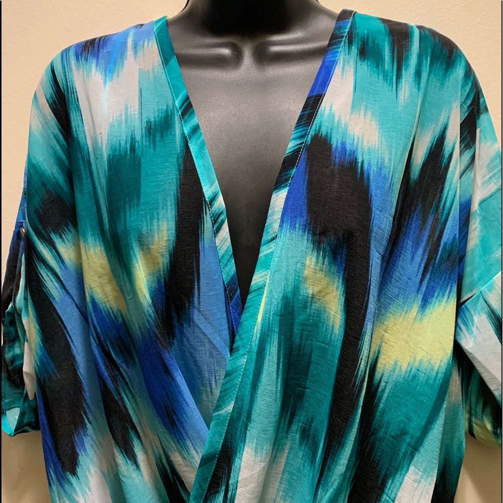 Jennifer Lopez crossover blouse size small